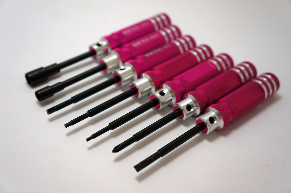 Nut Driver, Phillips Screwdriver and Flat Head Slotted Screwdriver on a white background.  Anodized handle aluminium