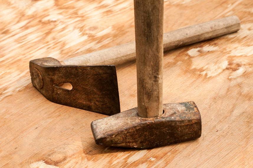 Old used hammer and adze